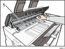 Illustration numérotée de l'intérieur du capot du scanner