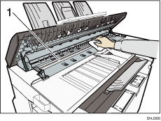 Illustration numérotée de l'intérieur du capot du scanner