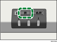 Illustration du bouton d'abaissement du réceptacle