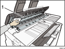 Illustration numérotée de l'intérieur du capot du scanner