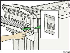 Illustration de la touche Suspendre/reprendre du finisseur